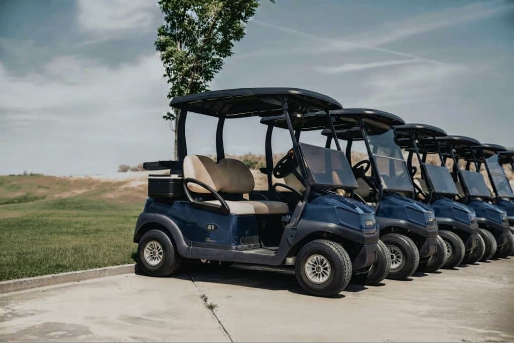 A fleet of golf carts fitted with Keogram roof-mounted solar panels